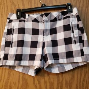 Cute, black and white checked ladies  dressy shorts. Never worn. Great condition